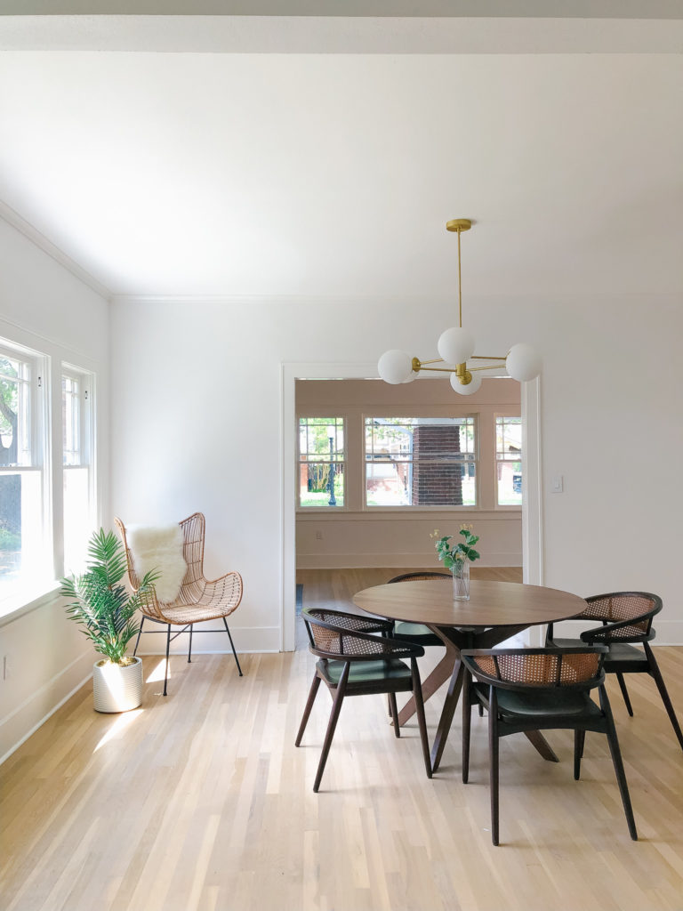 mid century mod dining room | 102-year-old fixer upper house renovation | mid century modern Scandinavian home design | house flip reno